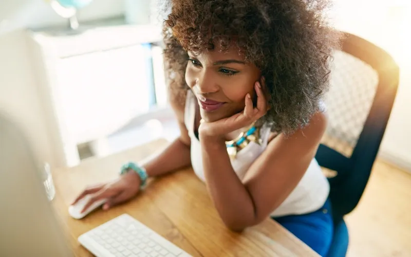 Small business owner looking online.